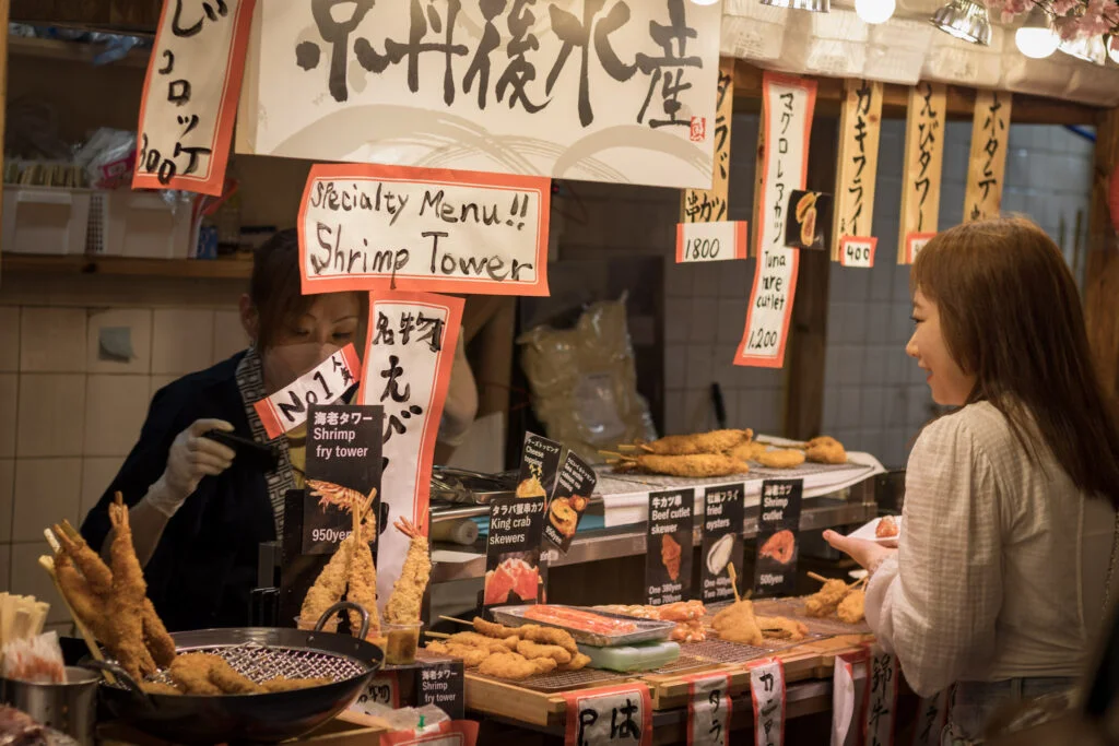 Street food at a market in Kyoto, Japan