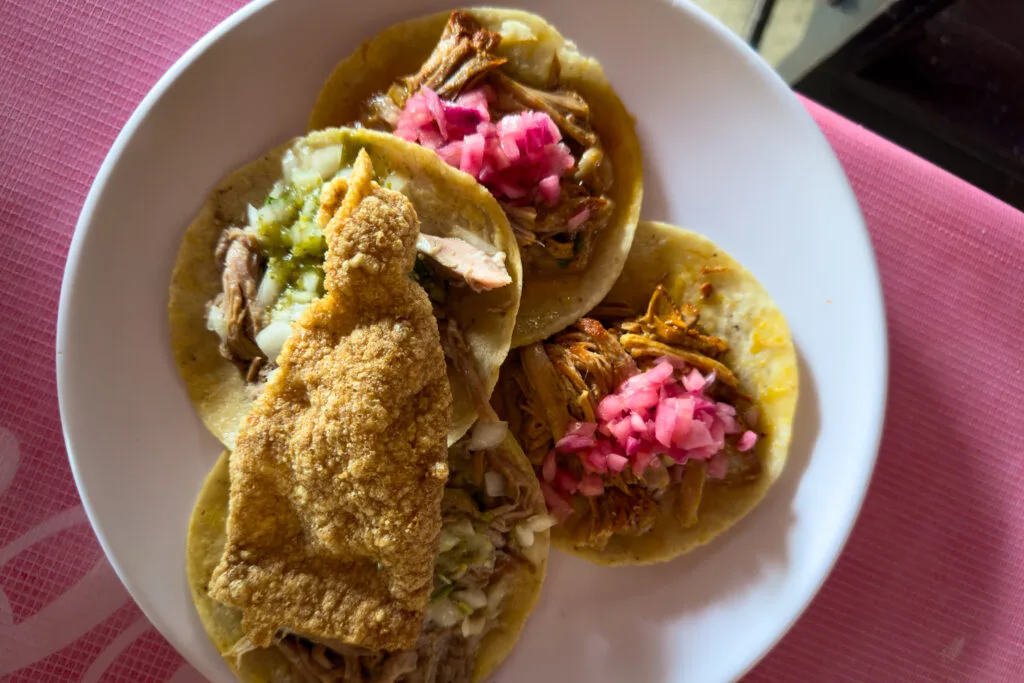 Tacos el Pastor and de Le Lechon, a must-try on the list of what to do in Tulum.