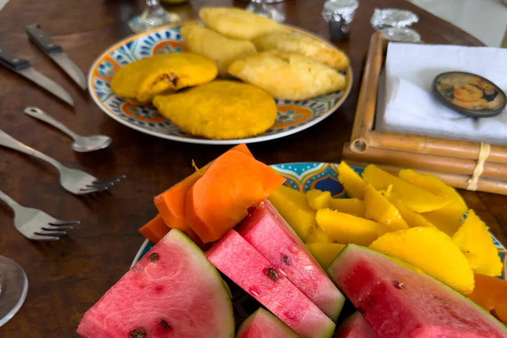 What to do in Cartagena, Colombia: Arepas and fresh fruit at a brunch with a local